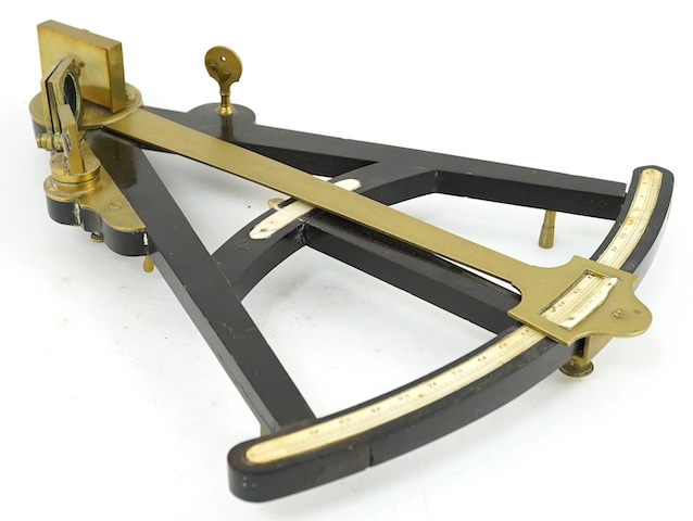 A Victorian brass mounted ebony octant with ivory scale, 36cm. Condition - poor, glass filter cracked and other minor damage overall. Ivory submission reference THSXLF51